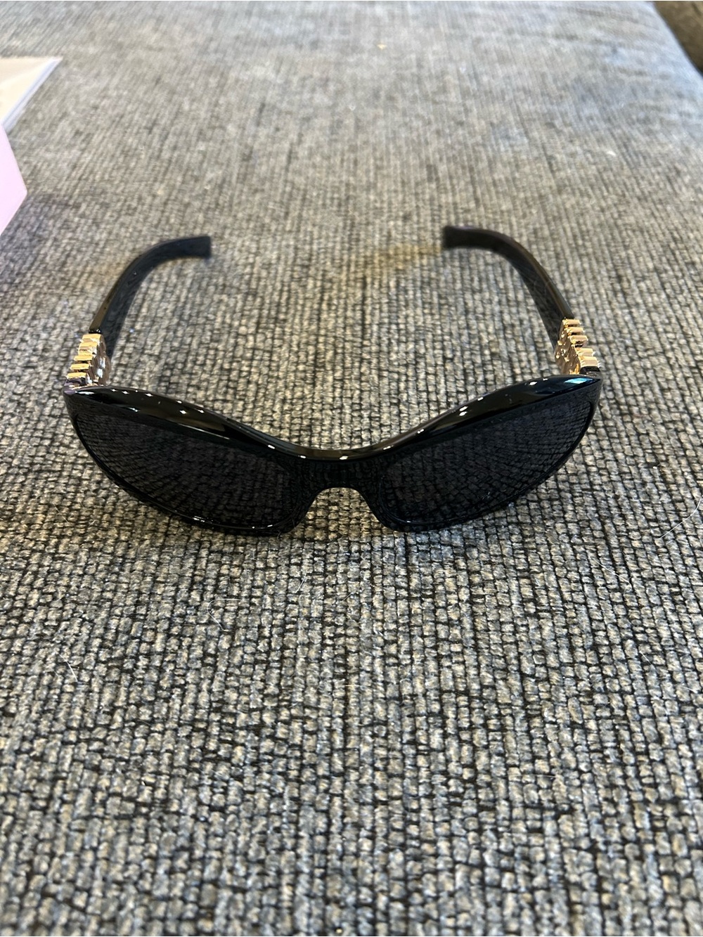 Miu Miu Black Sunglasses with Gold Temple Accents